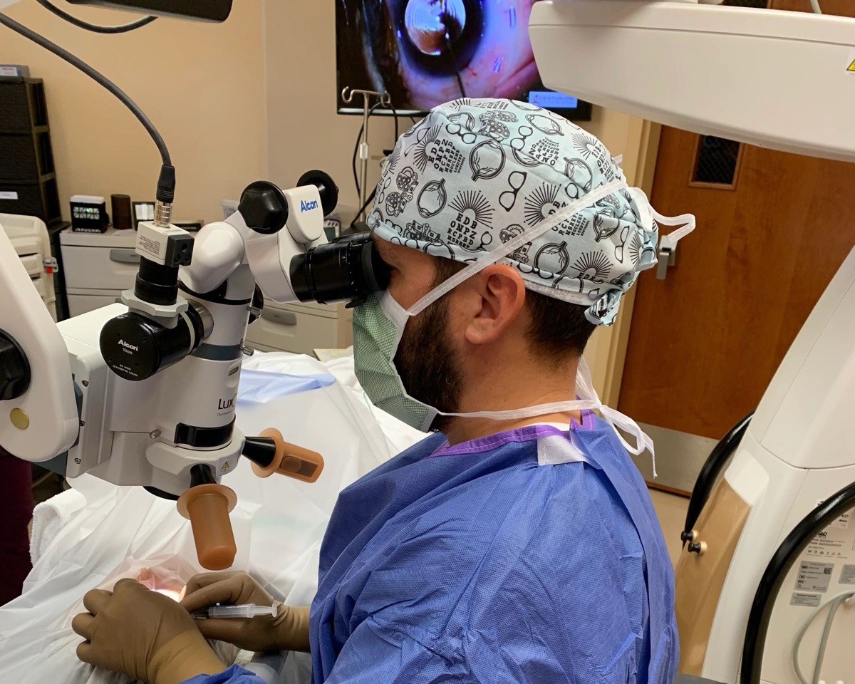 Eye surgery underway at the operating microscope in a surgical suite at Vision Care Center of Idaho